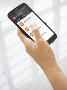Hand holding Mobile Smart phone with blank screen with Blurred background